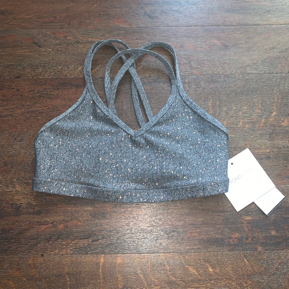 NWOT Beyond Yoga Cross Back sports bra.